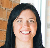 Sophie Hartwell, head of customer support leading a service team, portrait